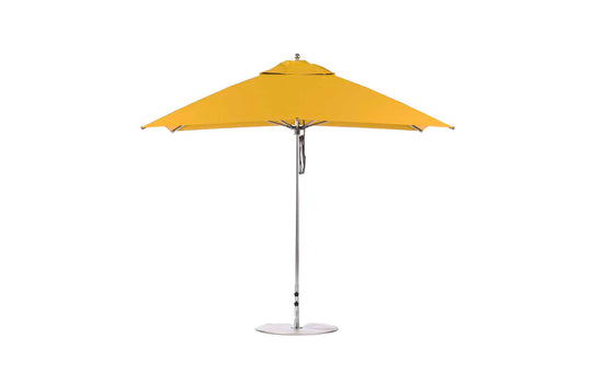 The Essential Fiberglass Umbrella by Ledge Lounger is a 10 square patio umbrella with a metal pole and base. Its simple, modern design includes a wide canopy made from marine-grade fabrics, ideal for outdoor use.