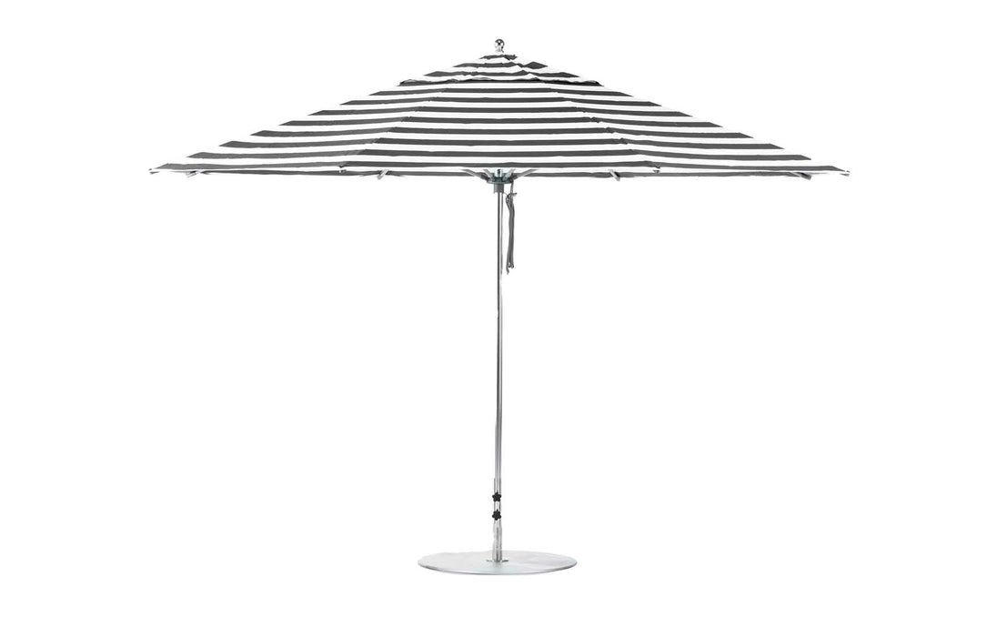 A Ledge Lounger Essential Fiberglass Umbrella, 13 Octagon with marine-grade fabrics in black and white stripes, metal pole, and round base, is displayed against a white background.