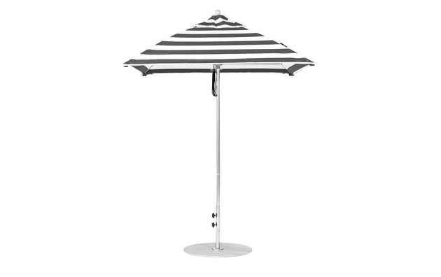 The Ledge Lounger Essential Fiberglass Umbrella - 6.5 Square Pulley has a black and white striped canopy on an aluminum center pole with a round base, offering modern minimalism. When open, its pattern is striking, and the adjustable clamps add convenience.