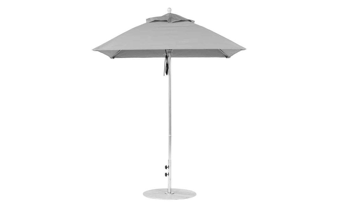 The Ledge Lounger Essential Fiberglass Umbrella - 6.5 Square Pulley offers a gray, marine-grade fabric canopy on a sleek aluminum pole with a round base, delivering elegant shade and style for any modern outdoor setting when opened against a plain white background.