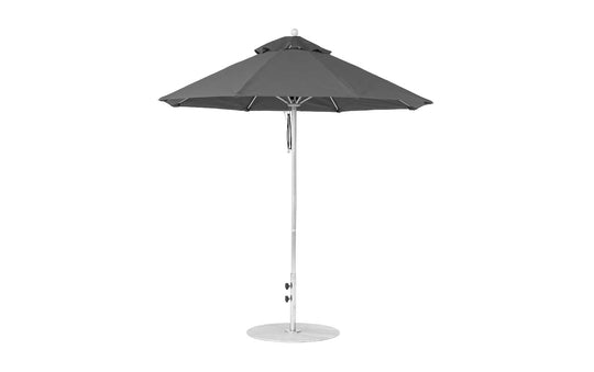 The Essential Fiberglass Umbrella - 7.5 Octagon Pulley by Ledge Lounger is a black outdoor umbrella with wind-resistant, marine-grade fabrics, complemented by a sturdy metal pole and round base.