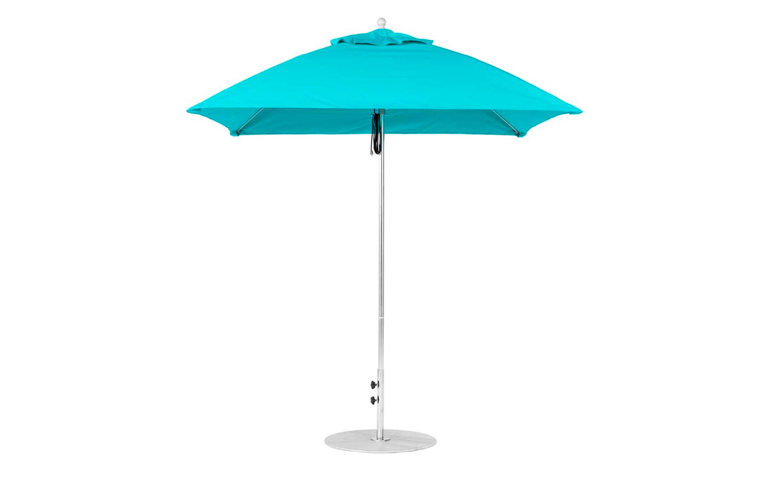 The Essential Fiberglass Umbrella - 7.5 Square Pulley by Ledge Lounger is a turquoise beach umbrella made from marine-grade fabrics with a silver metal pole and base, shown open against a white background, its smooth fabric ensuring durability.