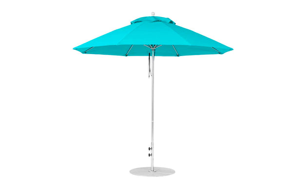 A turquoise 9 octagon pulley Essential Fiberglass Umbrella by Ledge Lounger features a silver pole and round base. Its vibrant marine-grade fabric and spoked design stand out against a plain white background, fully opened to display its structure.