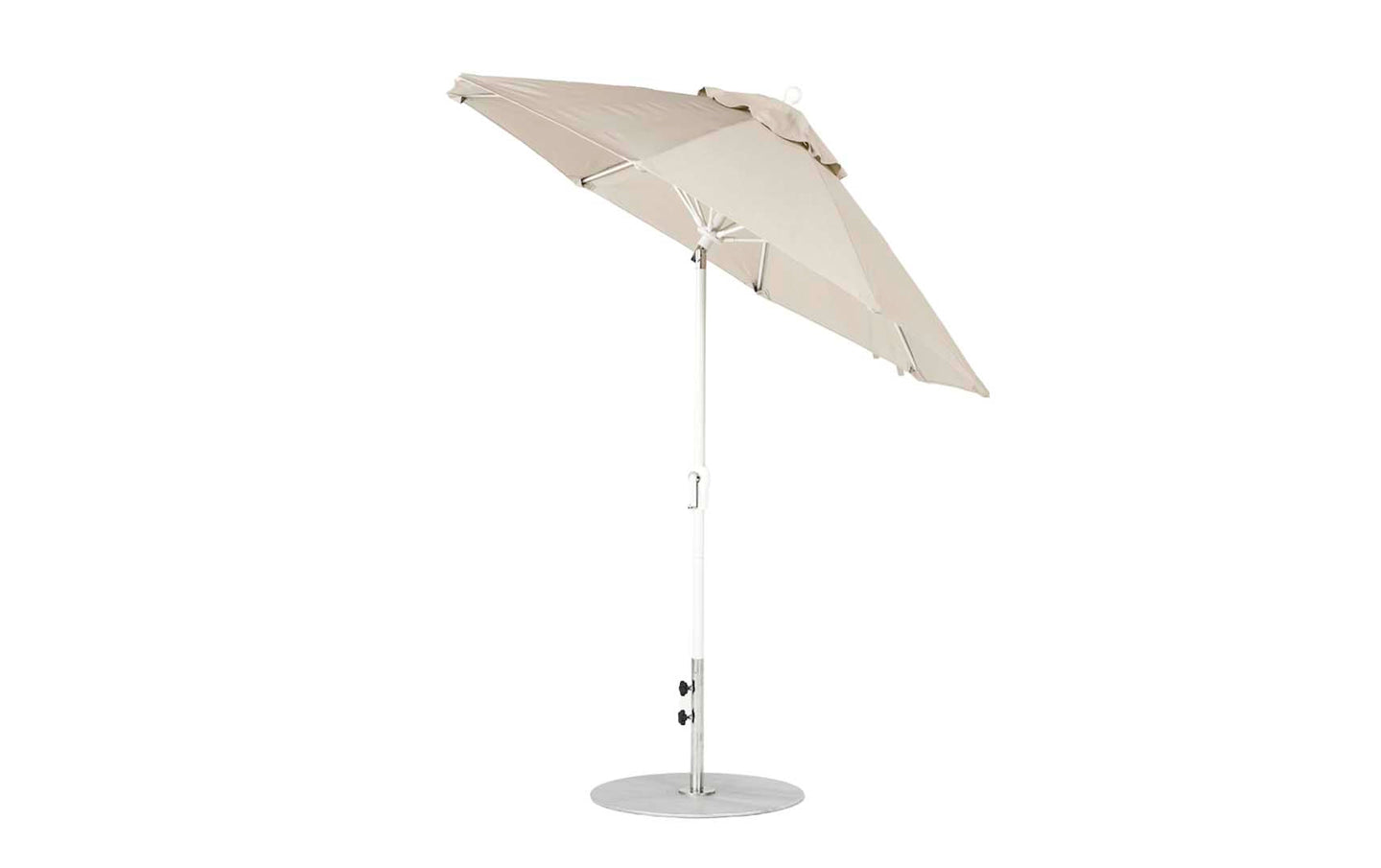 The Ledge Lounger Essential Fiberglass Umbrella, a 7.5 octagon with crank auto-tilt, features marine-grade beige fabric and a metal pole with round base. Wind-resistant and shown fully open against a plain white backdrop for an elegant look.