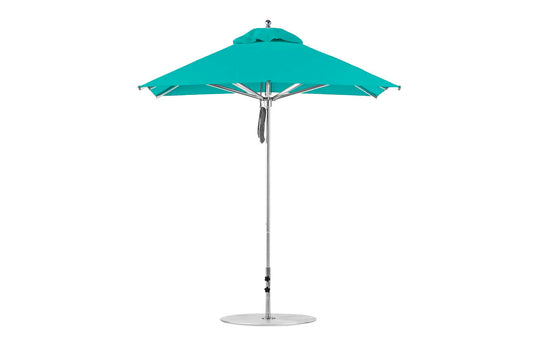 The Premier Aluminum Umbrella by Ledge Lounger features a 7.5 square canopy in turquoise with marine-grade fabrics, an aluminum pole, and a round base. Its vented top enhances airflow for wind resistance, making it ideal for garden or patio settings.