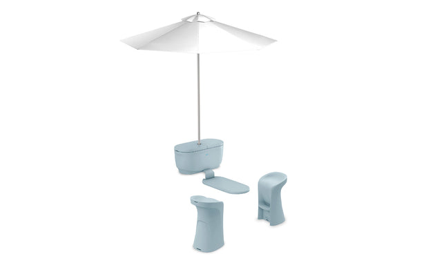 The Ledge Lounger PartyPad Swim-Up Bar is a modern outdoor set ideal for poolside relaxation, featuring a tall white parasol, a light blue pod-style table, and two curved-back stools. The sleek design contrasts elegantly with the crisp white background.