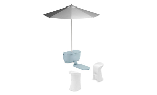 The minimalist setup includes Ledge Loungers PartyPad Swim-Up Bar with a large gray umbrella atop a light blue base, complete with a footrest for poolside relaxation. In front are two modern white chairs with curved backs, all set against an all-white backdrop.