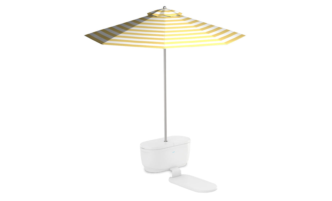 The Ledge Lounger PartyPad Swim-Up Bar is a whimsical toilet with a footrest and a yellow-and-white striped beach umbrella casting playful shadows, perfect for poolside sipping or adding an extravagant touch to your swim-up bar.