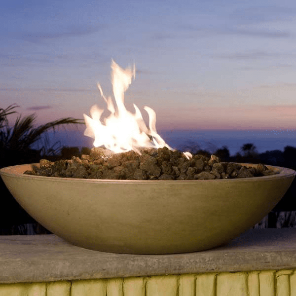 American Fyre Designs 40" Marseille fire bowl with a sleek black exterior and glass top.