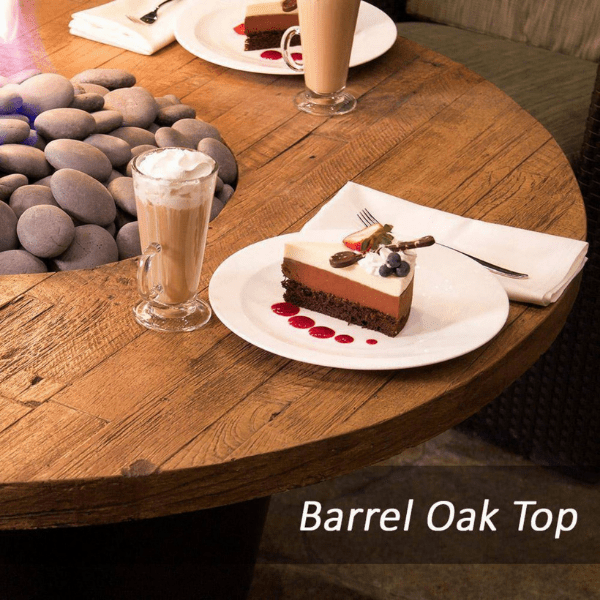 American Fyre Designs Cosmopolitan French barrel oak rectangle fire table with glass top and metal legs.