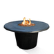 American Fyre Designs Cosmopolitan round fire table with glass top and metal frame.