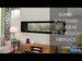 Empire Boulevard 60-inch linear vent-free see-through gas fireplace with modern glass front and sleek frame.