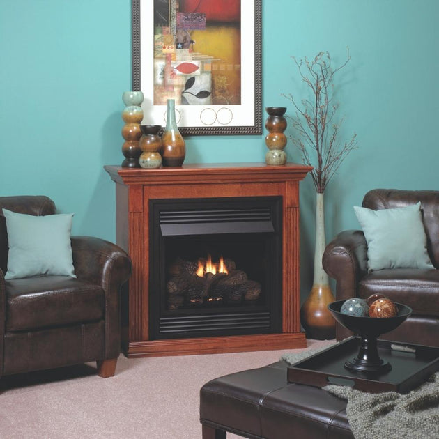 Empire Vail 26 Deluxe gas fireplace with modern mantel and burners.