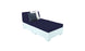 The Affinity 2 Piece Sun Chair by Ledge Lounger features a white base crafted from UV20 resin for outdoor durability, comes with two navy cushions, and a navy seat with decorative white and black pillows set against a plain white background.