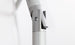 Close-up of a silver-gray metallic hinge with cylindrical components and a pivot mechanism, designed for the 7.5 Octagon Signature 360° Tilt Umbrella by Ledge Lounger, set against a plain white background.
